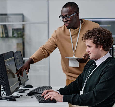 IT support specialists assisting with business technology systems in Las Vegas office